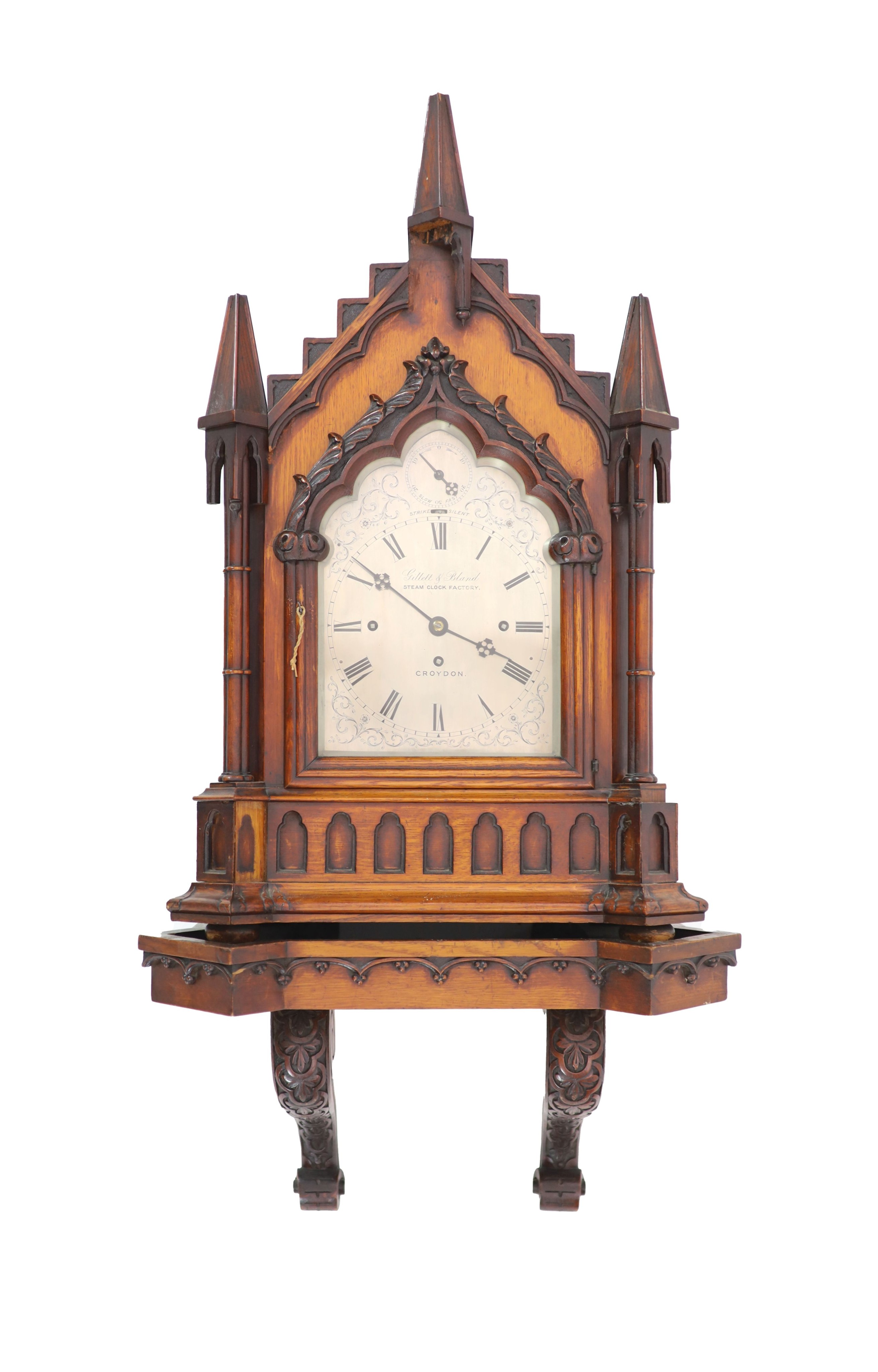 A Victorian golden oak Gothic design chiming bracket clock by Gillett & Bland, Steam Clock Factory, Croyden H 74cm. W 48cm. D 31cm.